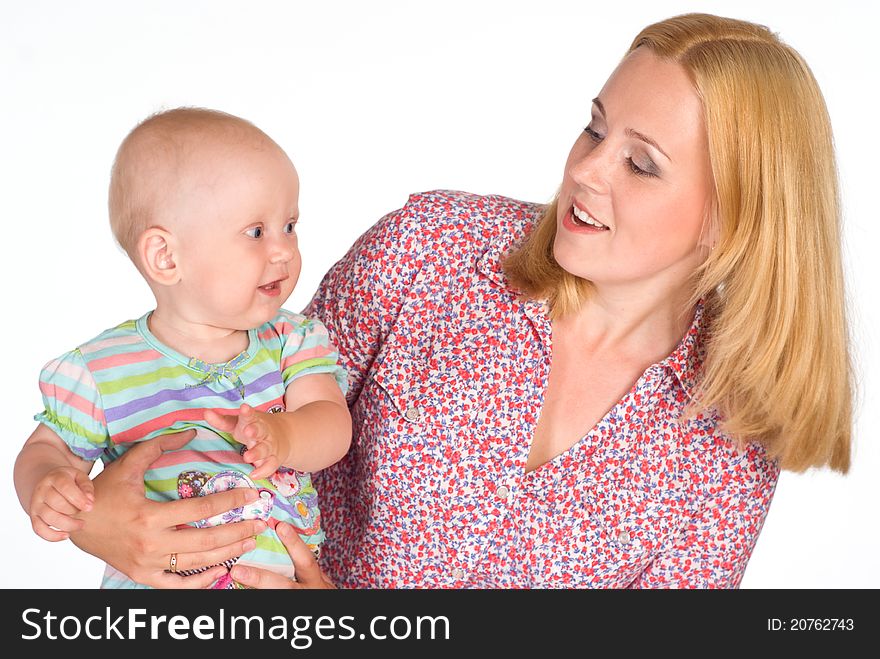 Cute mom holding her baby on whie. Cute mom holding her baby on whie