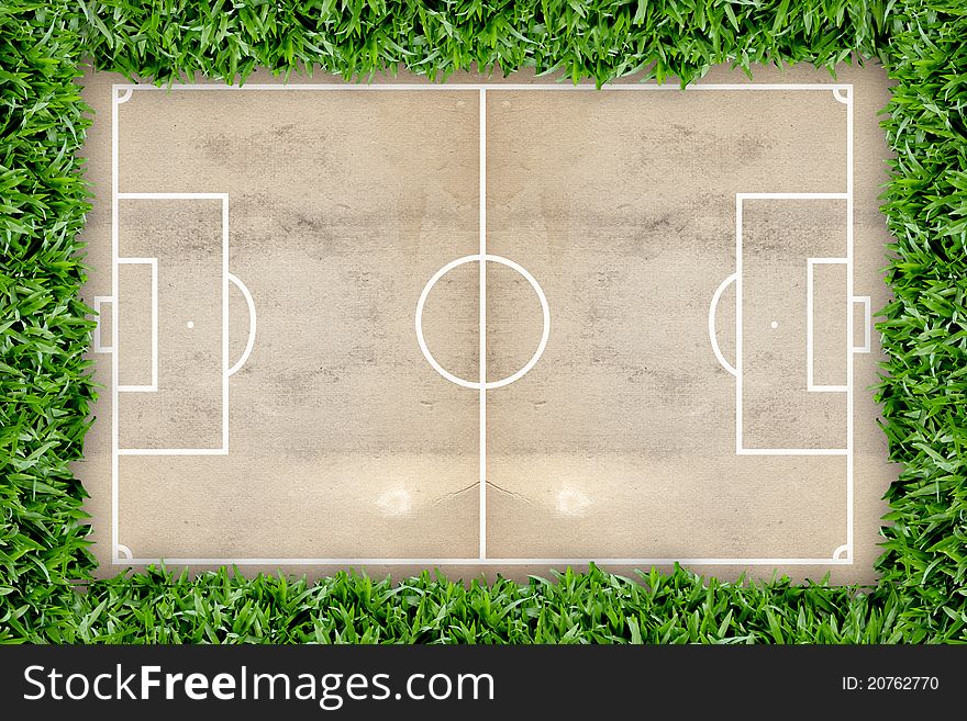 Soccer field pattern on grunge paper background in the green grass frame