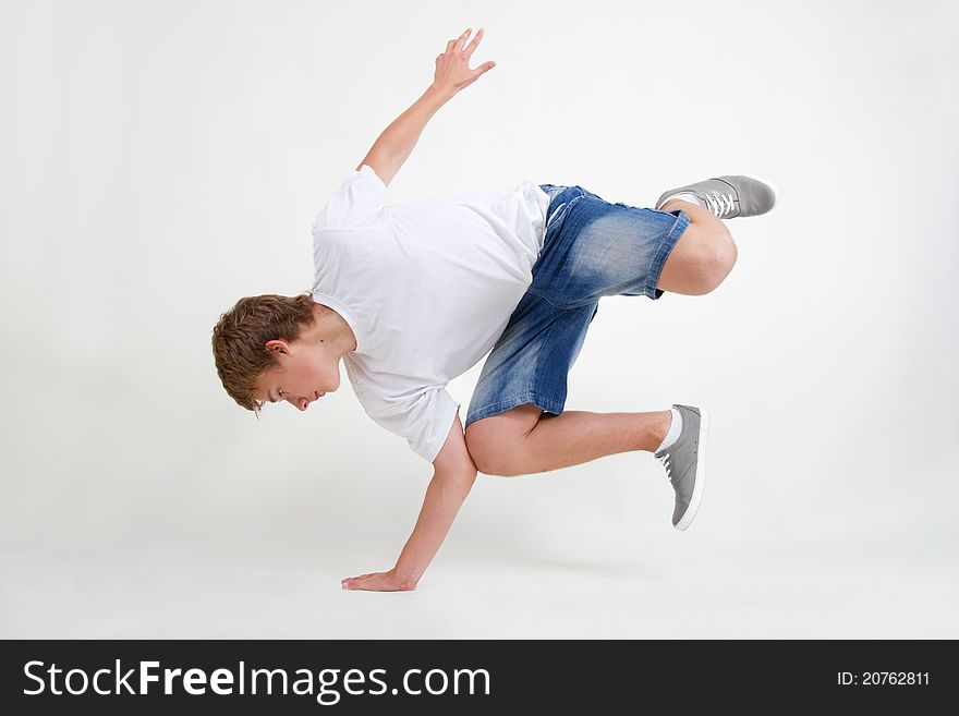 Teenager bboy training on white background. Teenager bboy training on white background