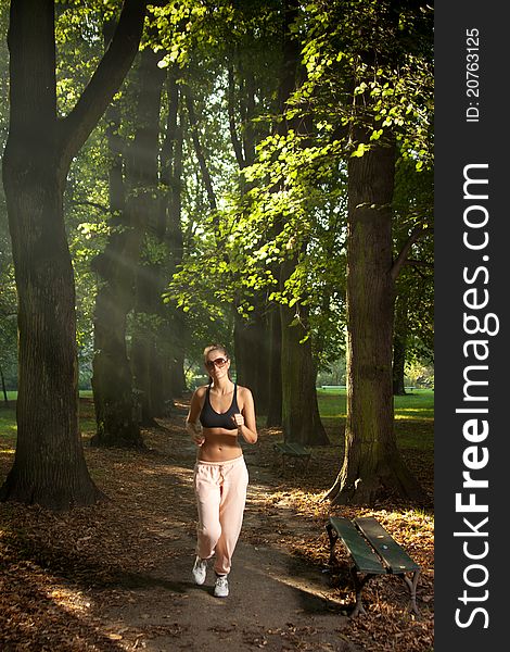 Woman Jogging In The Park