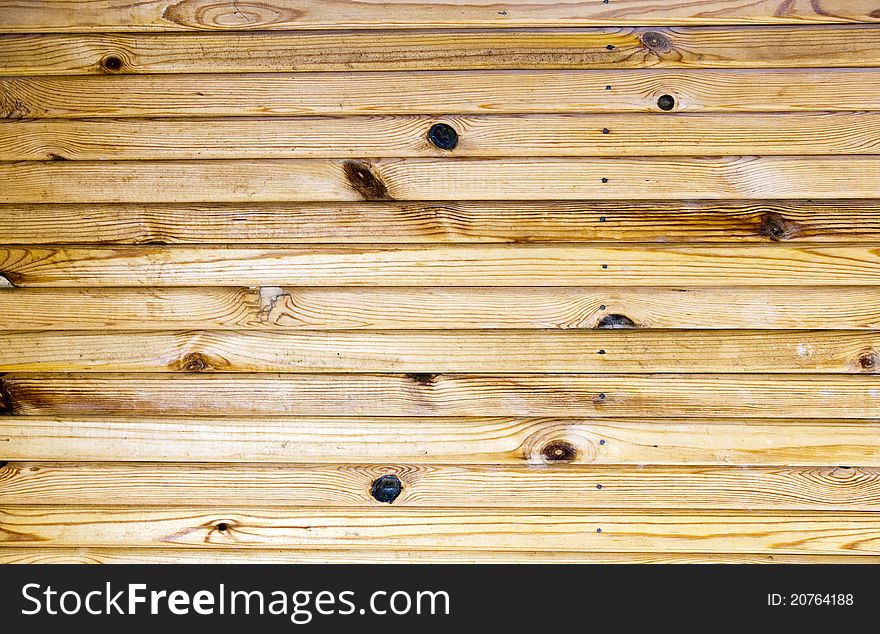 The texture of old scratched wooden planks. The texture of old scratched wooden planks