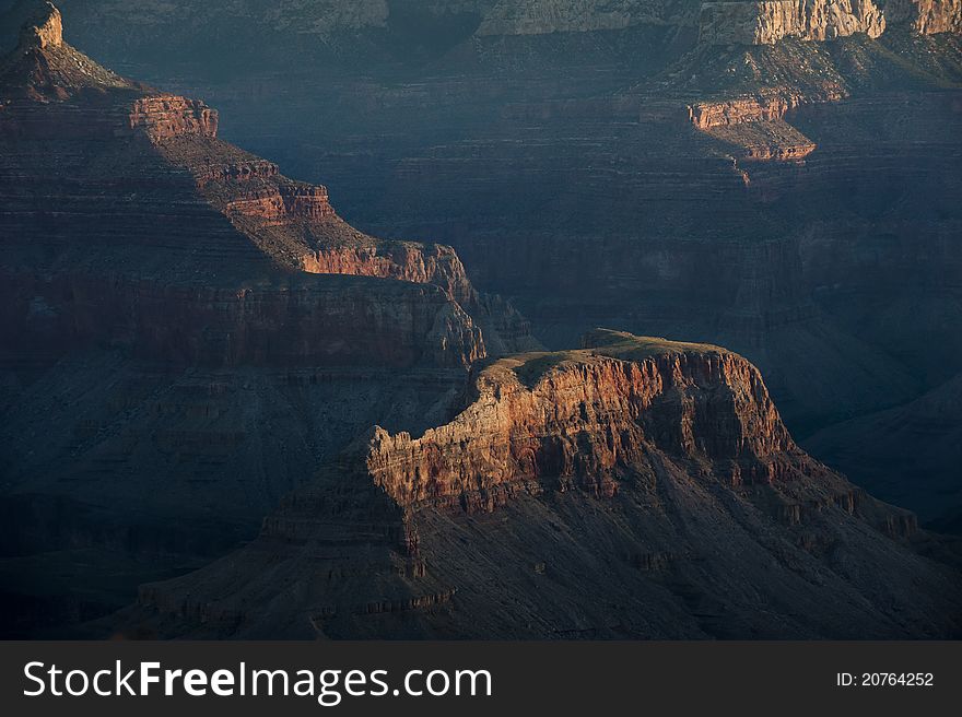 Detail of Grand Canyon mesa in morning shadows