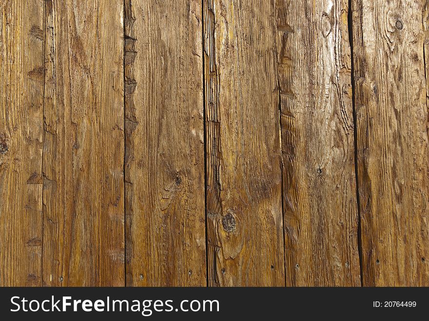 The texture of old scratched wooden planks. The texture of old scratched wooden planks