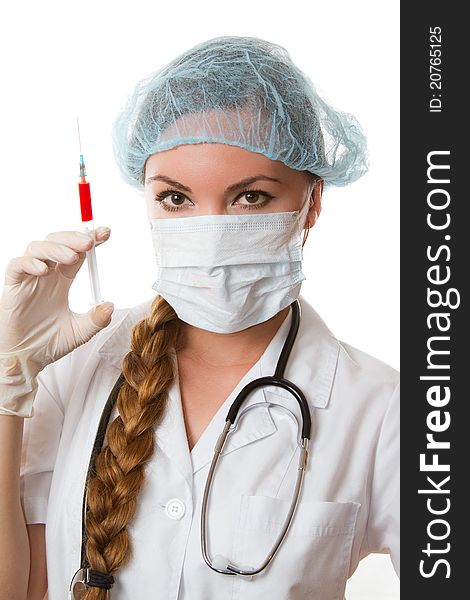 Nurse in white medical coat with a stethoscope and an injection. Nurse in white medical coat with a stethoscope and an injection