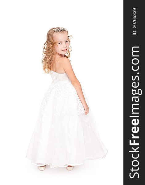 Pretty little girl in beautiful white dress