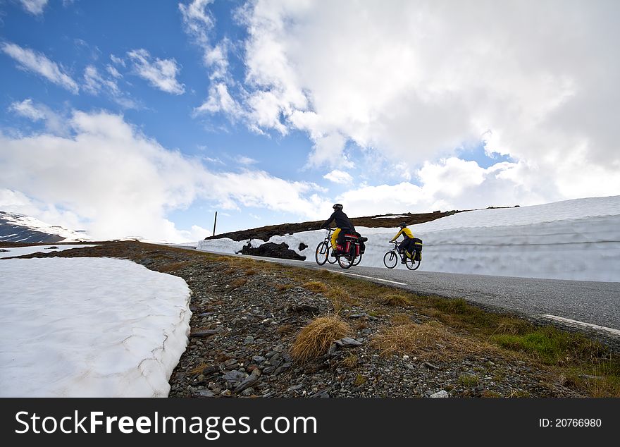 Group biking in high mountains in Norway. Group biking in high mountains in Norway