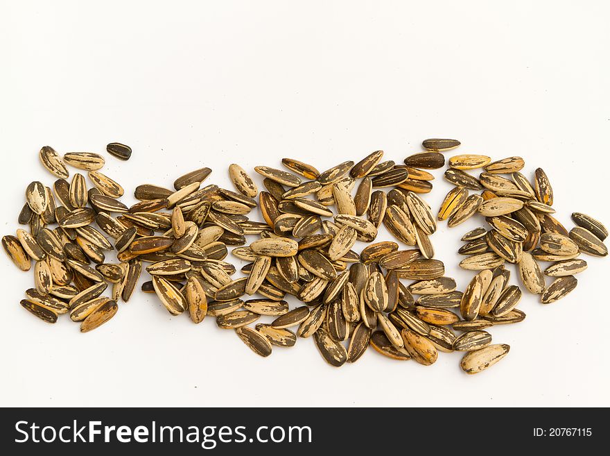 Sunflower seeds on white background