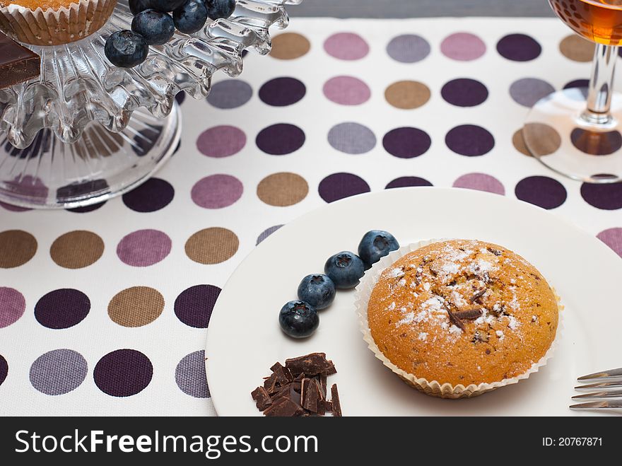 Set of chocolate muffin and passito wine