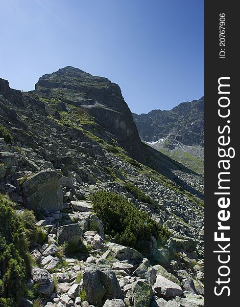 Tatra mountains and a lot of stones. Taka a look on a climber on the left. Tatra mountains and a lot of stones. Taka a look on a climber on the left.