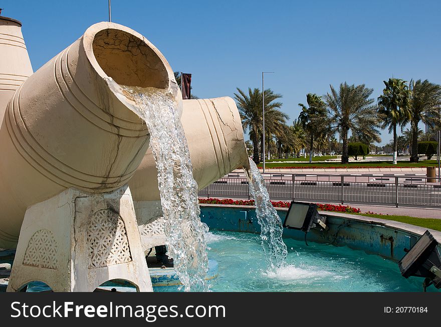 A fountain made of water pots on the corniche in Doha. A fountain made of water pots on the corniche in Doha.