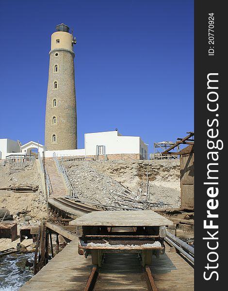 An off shore lighthouse and the small service jetty used by the staff for loading provisions. An off shore lighthouse and the small service jetty used by the staff for loading provisions