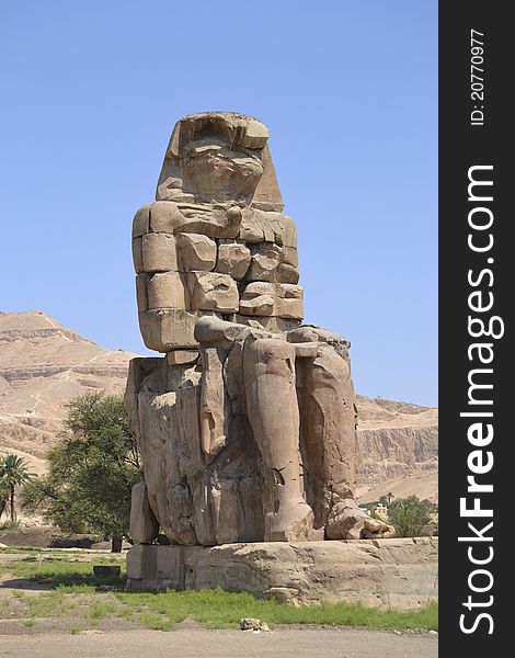 One of the colossus statues at the Temple of Memnon. One of the colossus statues at the Temple of Memnon