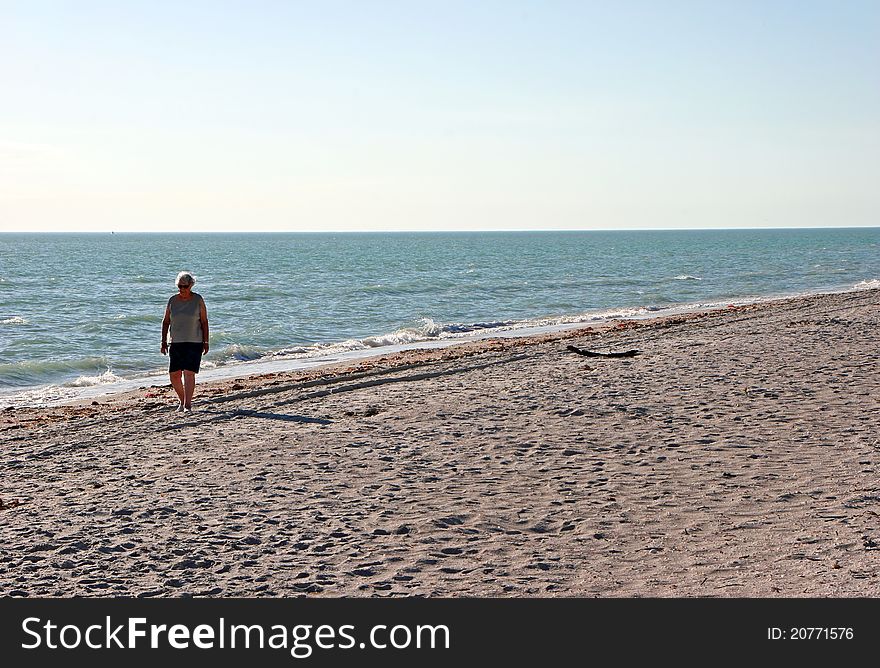 Senior Woman On Beach Sanibel Island Florida