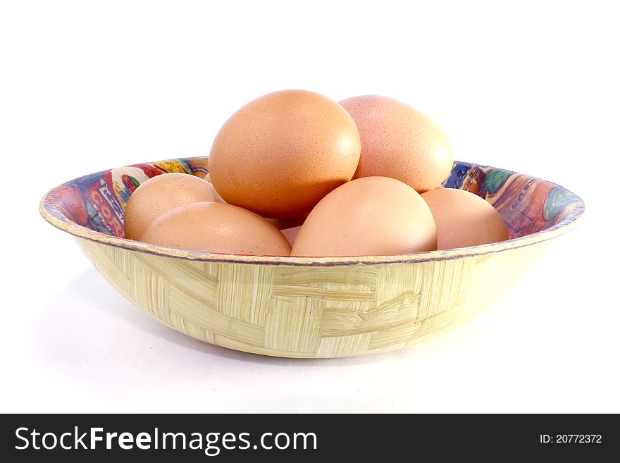 Bowl filled with uncooked whole white eggs. Bowl filled with uncooked whole white eggs