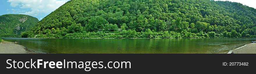 A panoramic of mountains surrounding the Delaware River. A panoramic of mountains surrounding the Delaware River.