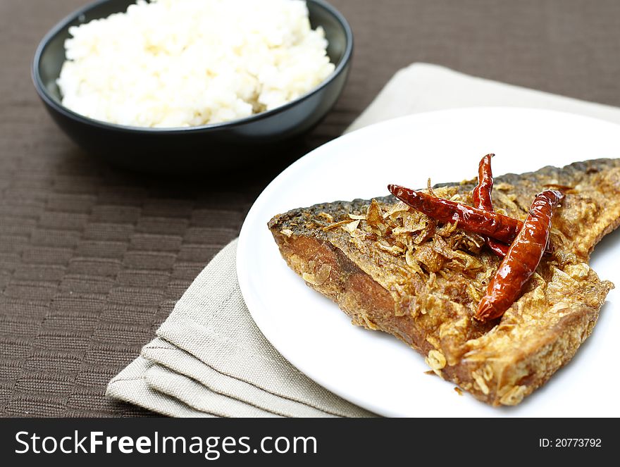Delicious thai food. Fried fish spicy with rice