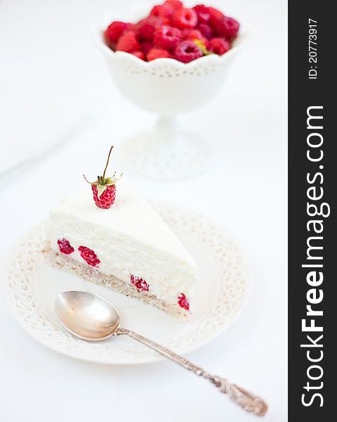 Close up of raspberry cake over white plate. Close up of raspberry cake over white plate