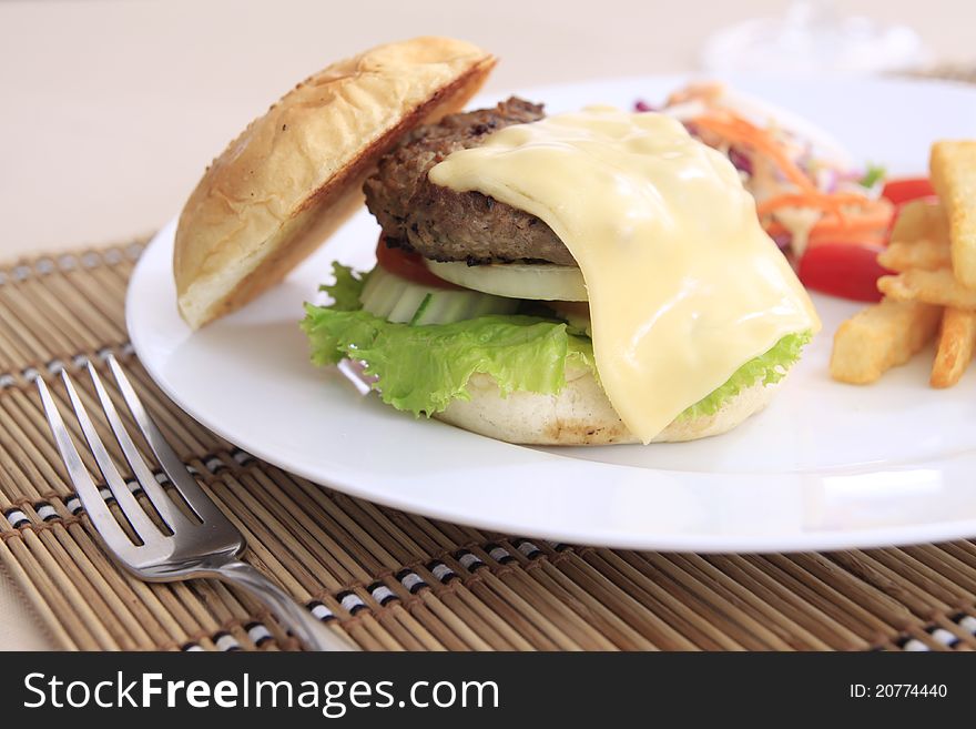 Cheese burger and french fried. Cheese burger and french fried
