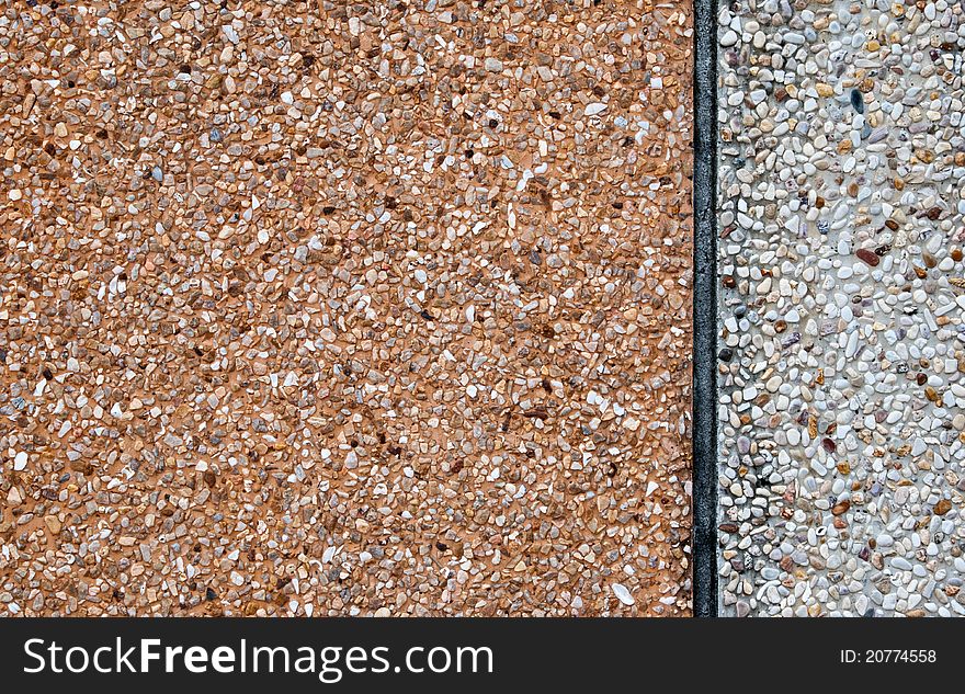 An image of a concrete wall covered by pebble dash. An image of a concrete wall covered by pebble dash.