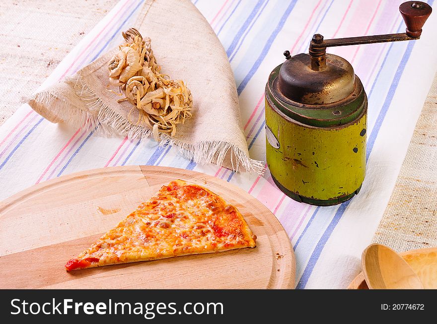 Italian Pizza Slice On Table