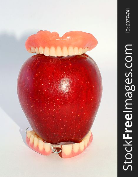 The Dentures and the Apple. The Dentures and the Apple