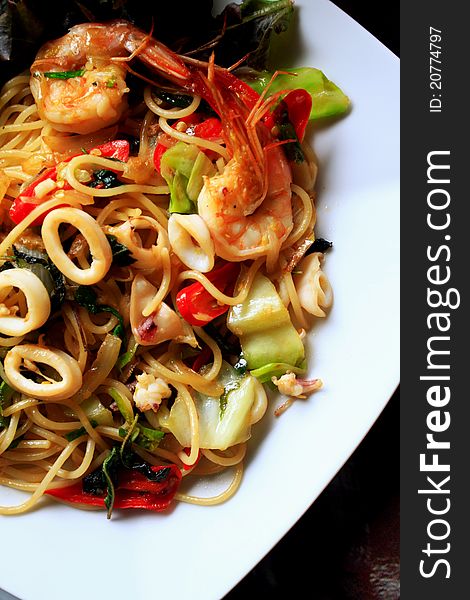 Spaghetti seafood on white dish