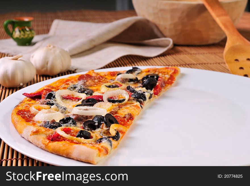 Italian Pizza Slice On Table