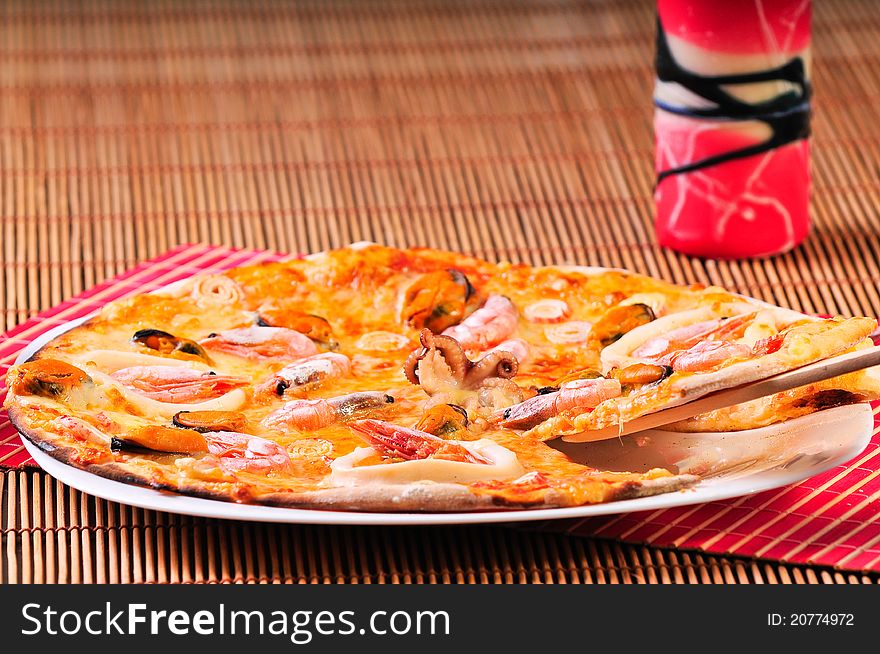 Italian Pizza Slice On Table