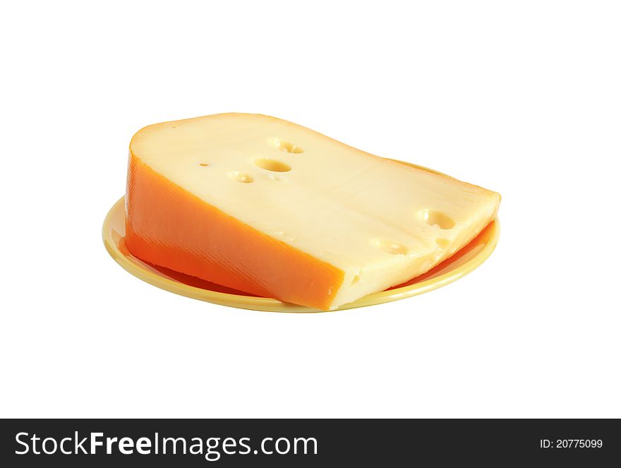 Piece of cheese on yellow plate. Isolated on white with clipping path. Piece of cheese on yellow plate. Isolated on white with clipping path