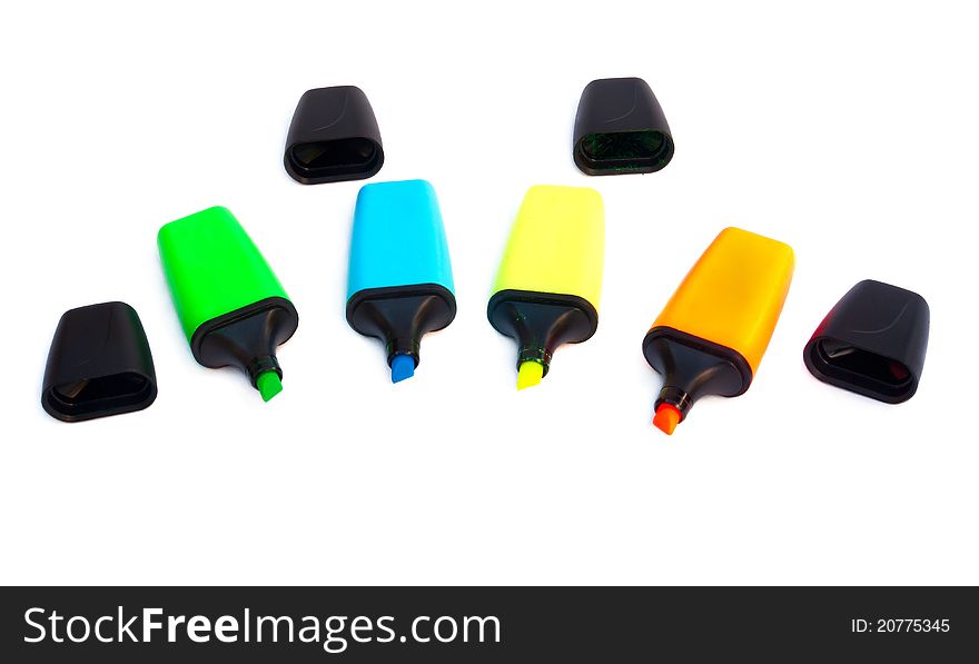 Colored markers isolated on a white background