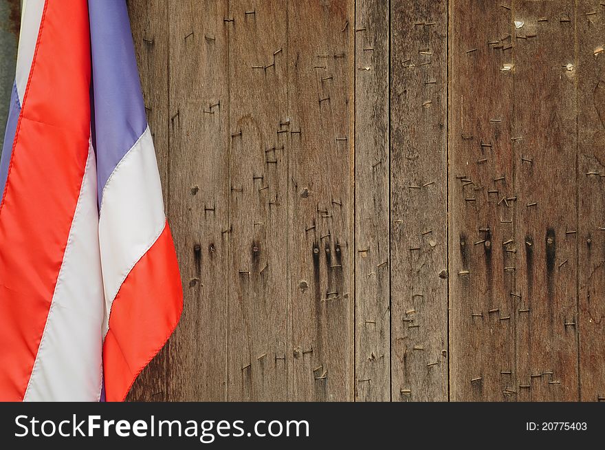 Wooden windows and Thailand flag