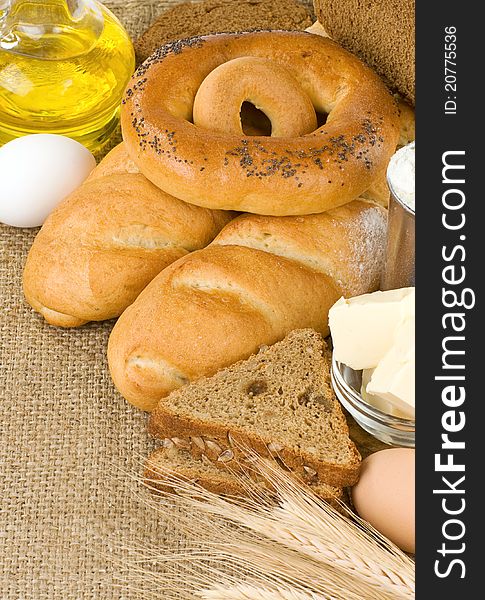 Bakery products and grain on sack burlap