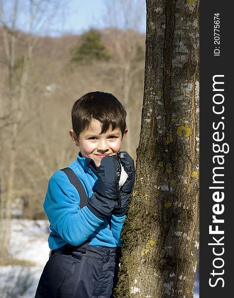 A lovely child posing on the snow. A lovely child posing on the snow