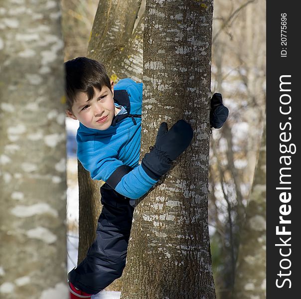 A lovely child posing on the snow. A lovely child posing on the snow