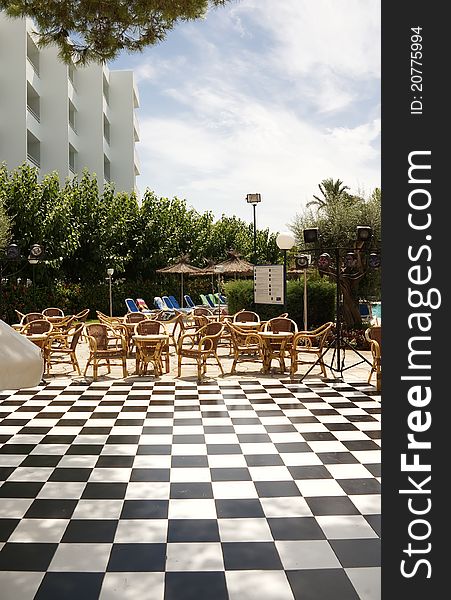 Outdoors of an hotel ( swimming pool and restaurant view ). Outdoors of an hotel ( swimming pool and restaurant view )