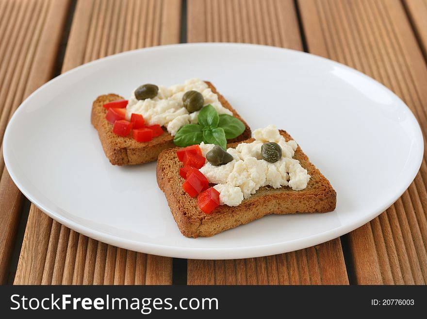 Toasts with cottage cheese and pepper