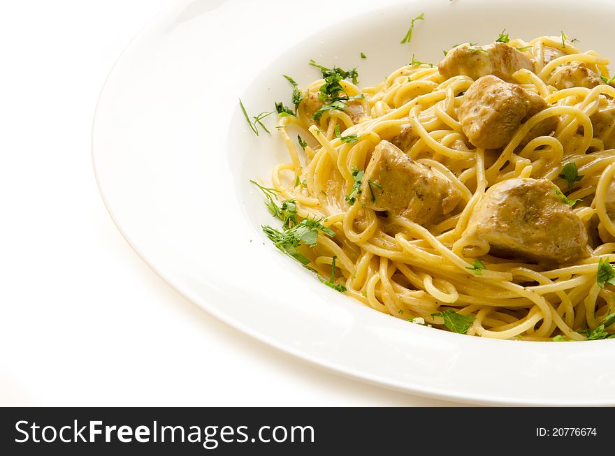 Plate of spaghetti with meat and herbs