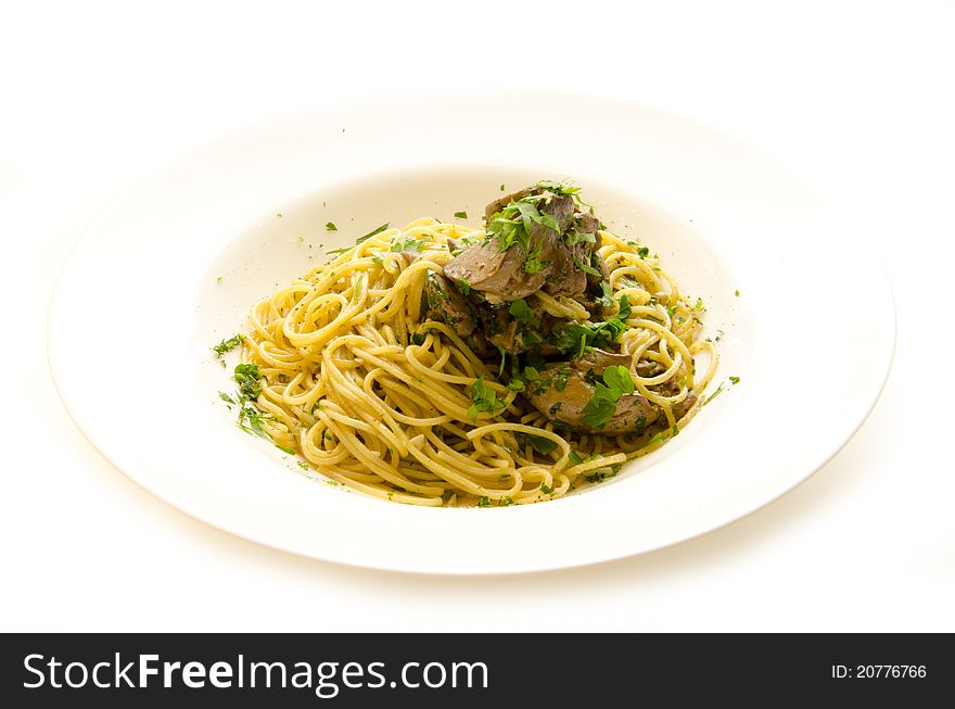 Plate of spaghetti with meat and herbs