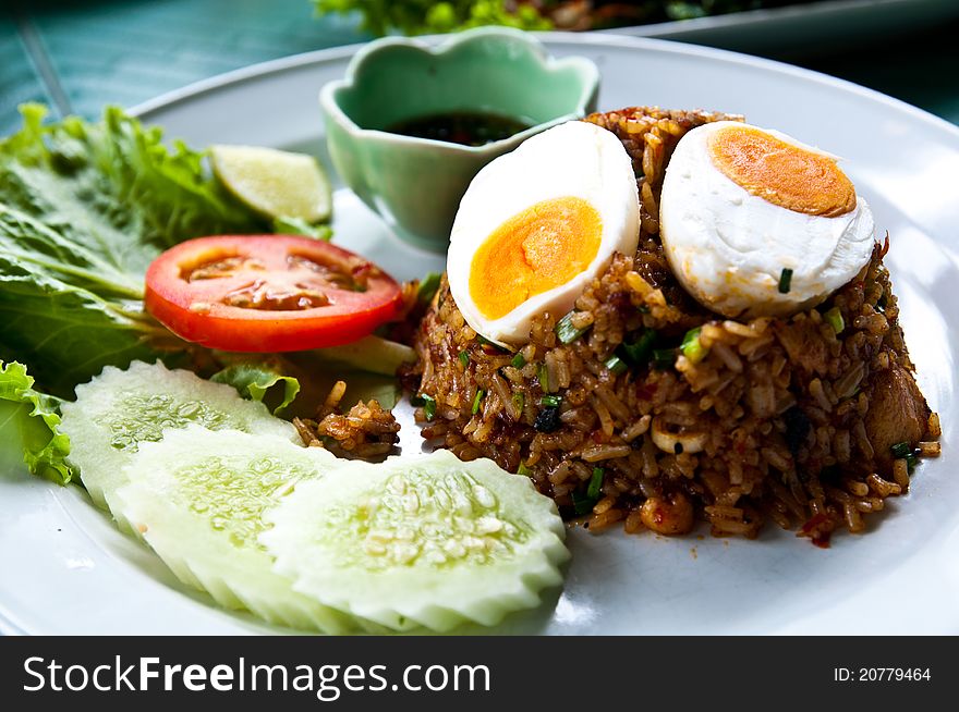 Fried rice with chili dip, pork and salt egg