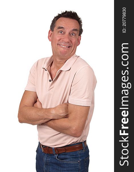 Attractive Middle Age Man Making Silly Funny Smile with Arms Folded. Attractive Middle Age Man Making Silly Funny Smile with Arms Folded