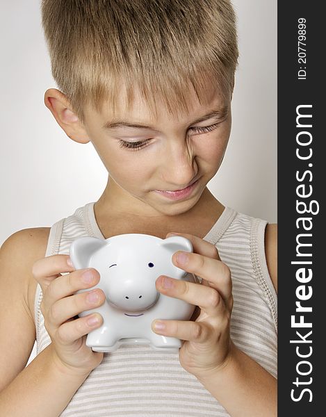 Boy with piggy bank