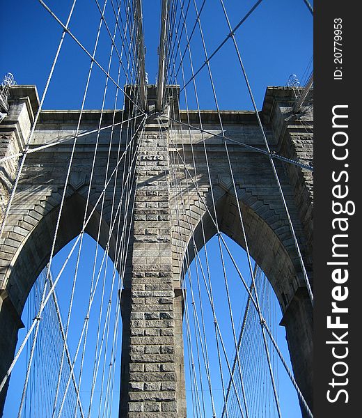 A close crop of the Brooklyn Bridge. One of New York's most famous landmarks and the crossing from Brooklyn to Manhattan over the East River.