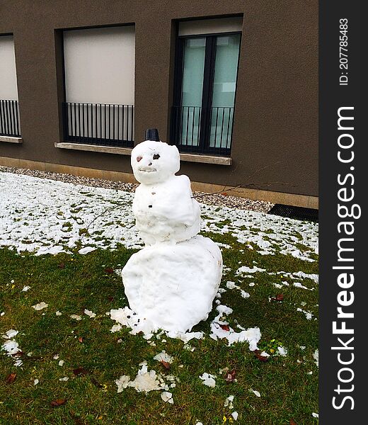 snowman on the green grass in the yard of the house  Ljubljana  Slovenia.