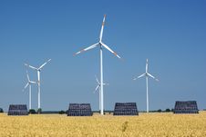 Wind Turbine And Sunny Batteries Royalty Free Stock Image Wind Turbine And Sunny Batteries Royalty Free Stock Image