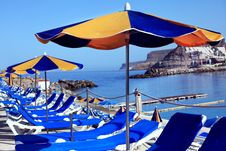 Deck Chairs And Umbrellas Royalty Free Stock Photo