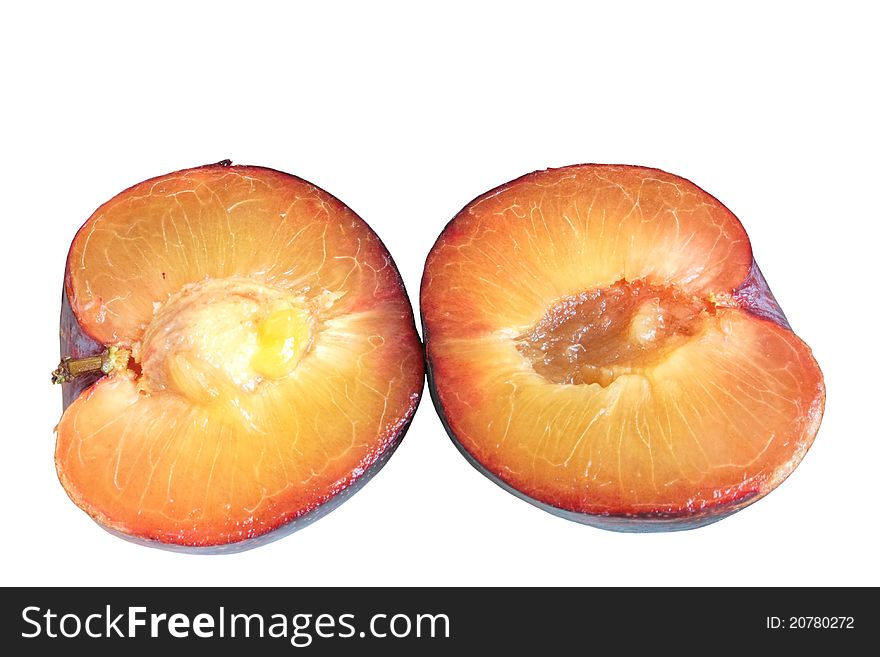 Two half red plum isolated over white background