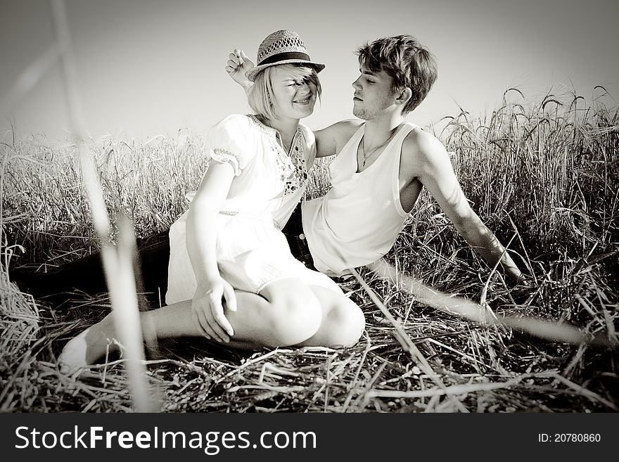 Image Of Young Man And Woman On Wheat Field