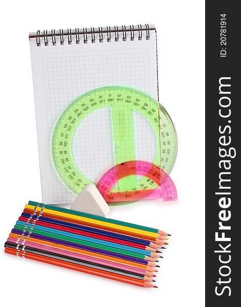 Color photo of a set of pencils on notepad. Color photo of a set of pencils on notepad