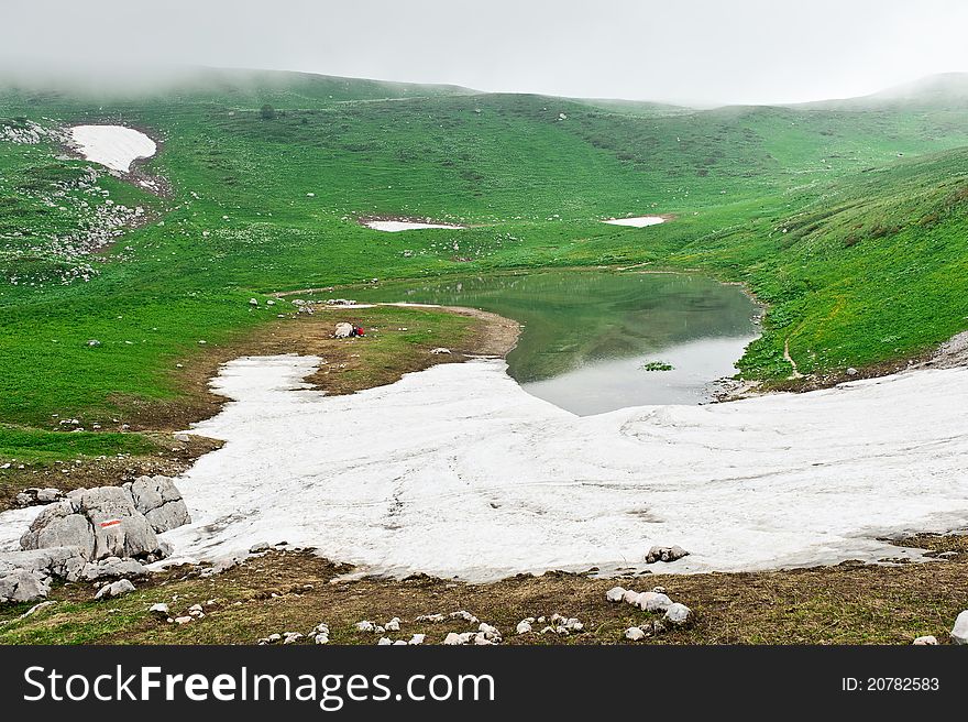 Photo by mountain scenery and a mountain lake. The mountains of North Caucasus