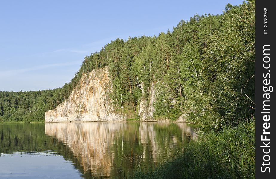 Mountain rock on Neiva river in Ural mountains. Mountain rock on Neiva river in Ural mountains.